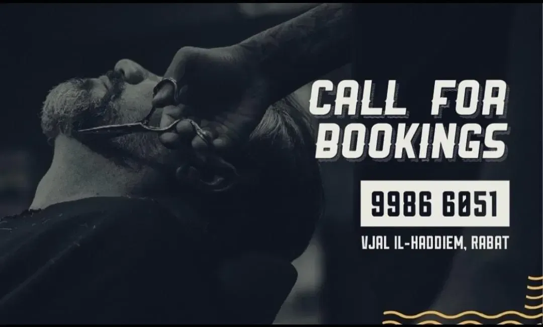 Sharp Cutz barber performing a close grooming service
